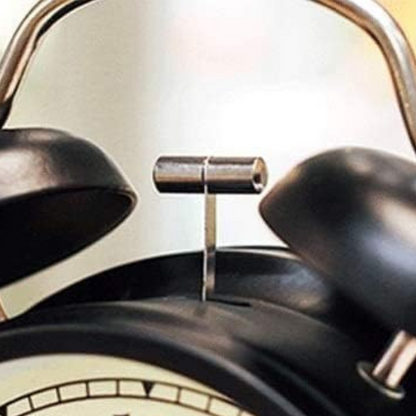 Réveil lumineux à quartz.