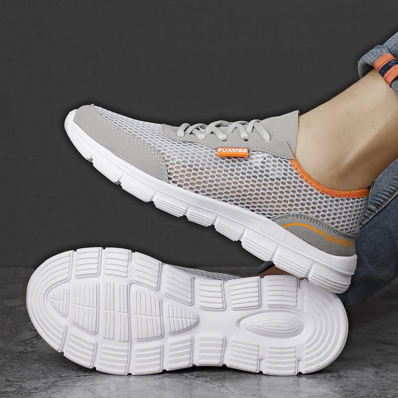 Baskets de course en maille d'été pour hommes.